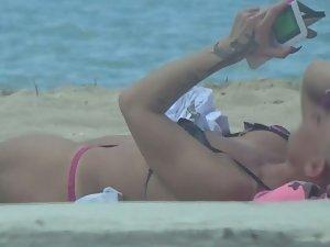 Punk girl is an unique sight on beach Picture 1