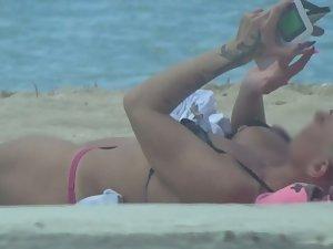 Punk girl is an unique sight on beach Picture 2