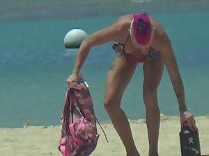 Punk girl is an unique sight on beach Picture 7