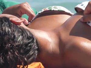 Inspecting her nipple from inside bikini top Picture 4