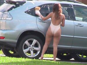 Thick neighbor girl wears swimsuit while washing car Picture 4