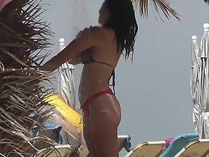 Sensational ass in red thong bikini Picture 6