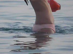 Wet teen girl nearly loses her bikini Picture 7