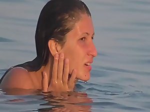 Wet teen girl nearly loses her bikini