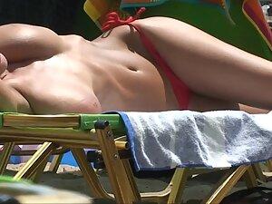 Big boobs and pussy slip of seductive girl at beach Picture 1