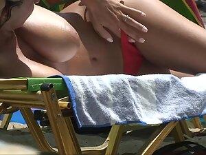 Big boobs and pussy slip of seductive girl at beach Picture 3