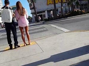 Gorgeous tanned legs of hot girl on the street Picture 2
