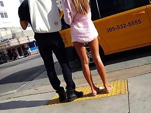 Gorgeous tanned legs of hot girl on the street Picture 4
