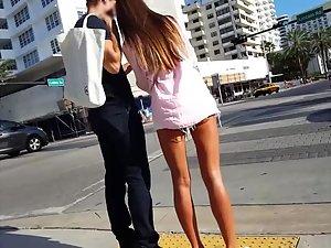 Gorgeous tanned legs of hot girl on the street Picture 5