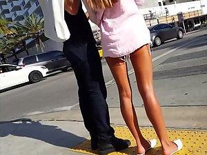 Gorgeous tanned legs of hot girl on the street Picture 6