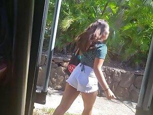 Bus voyeur waits to see hot booty in white shorts
