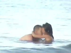 Wild fuck in the water caught by a voyeur Picture 3