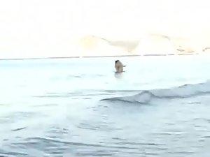 Wild fuck in the water caught by a voyeur Picture 7