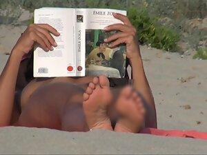 Nudist girl looks fuckable when she reads a book on beach Picture 4