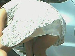 Young milf's upskirt while bending over Picture 8