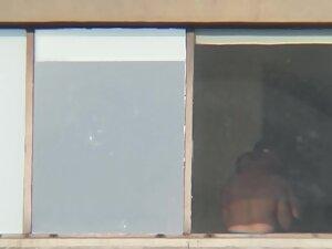 Peeping on busty woman getting a hug Picture 1