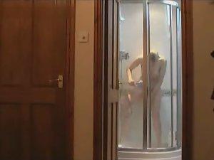 Milf spied masturbating in the shower Picture 7