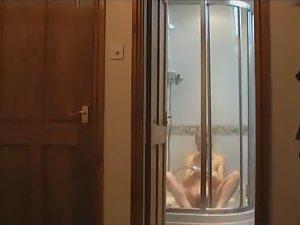Milf spied masturbating in the shower Picture 8