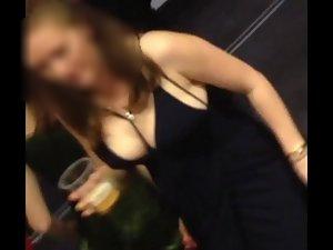 Little black dress reveals her big boobs Picture 1