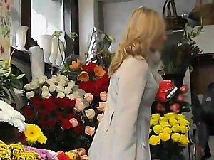 Refined girl's upskirt in a flower store Picture 2