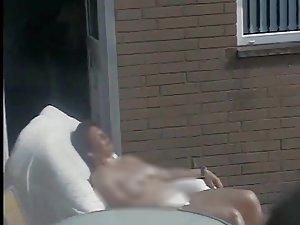 Mature neighbor woman caught tanning Picture 3
