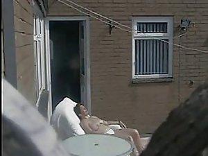 Mature neighbor woman caught tanning