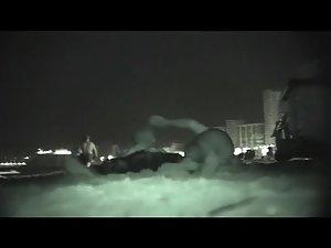 Voyeur films couples at night on a beach Picture 4