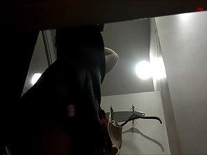 Woman's round butt in a dressing cabin Picture 4