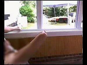 Girl masturbates in front of a window Picture 8