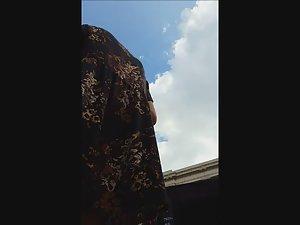 Wind shows her thong and bra in upskirt Picture 2