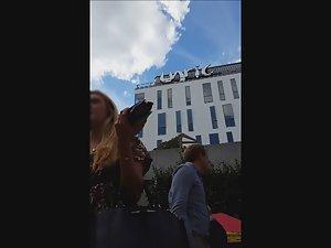 Wind shows her thong and bra in upskirt Picture 8