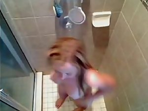Aerial view of a showering girl