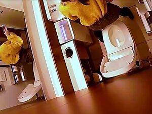 Hidden cam caught her finger pussy in a restroom Picture 3