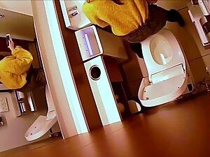 Hidden cam caught her finger pussy in a restroom Picture 4