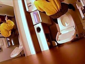 Hidden cam caught her finger pussy in a restroom Picture 5