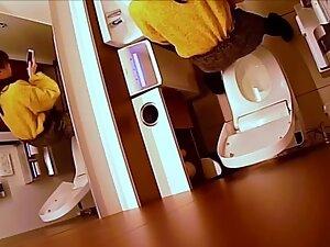 Hidden cam caught her finger pussy in a restroom Picture 6