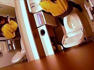 Hidden cam caught her finger pussy in a restroom Picture 8