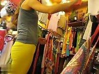 Thongs peeking out of her yellow pants Picture 7