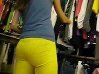 Thongs peeking out of her yellow pants Picture 8