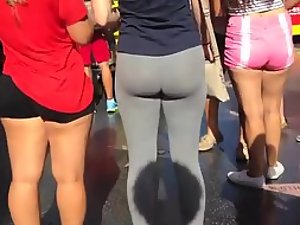 Adorable round ass in tight yoga pants