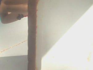 Hot young babe changing in a beach cabin Picture 8