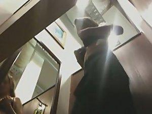 Hot girl puts new clothes on