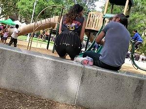 Visible thong of sexy milf on the playground Picture 3