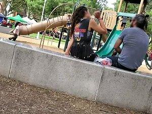 Visible thong of sexy milf on the playground Picture 4