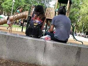 Visible thong of sexy milf on the playground Picture 5