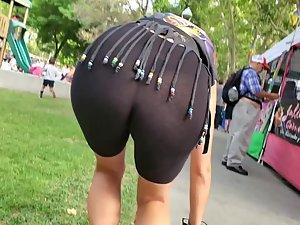 Visible thong of sexy milf on the playground Picture 8