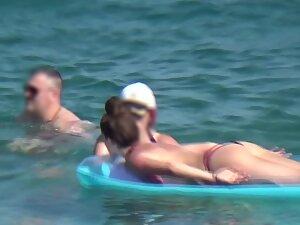 Her ass looks seductive while she floats on water Picture 2