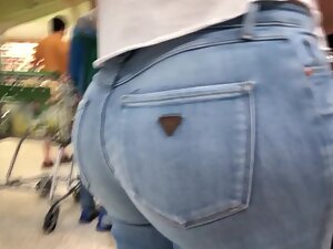 Big butt cheeks in very tight jeans