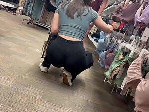 Crouching makes her ass and thong look perfect Picture 4
