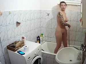 Wild girl caught by hidden camera while showering Picture 2